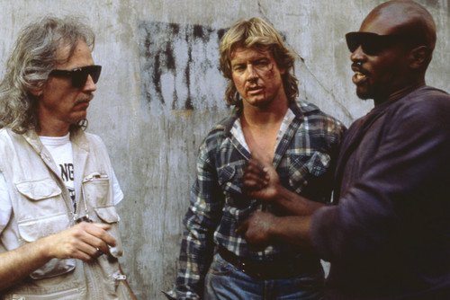 John Carpenter and Roddy Piper and Keith David in They Live